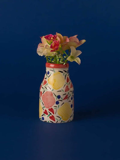 Milk Bottle Vase 

DIMENSIONS:
Small - Bottom Dia 2.5 x 4.5H Inches


Large - Bottom Dia 3.5 x 6.5H Inches

Made of Ceramic Stoneware
Milk Bottle VaseThe Wishing Chair
