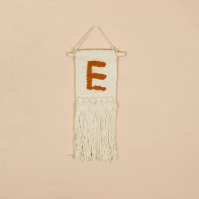 Monogram Mini Wall HangingMaterial: Cotton
Dimensions: 4L inch x 10H inch.
Note: The Alphabet letter embroidery is made of recycled thread the color will vary as per the availability.

The ImMonogram Mini Wall HangingThe Wishing Chair