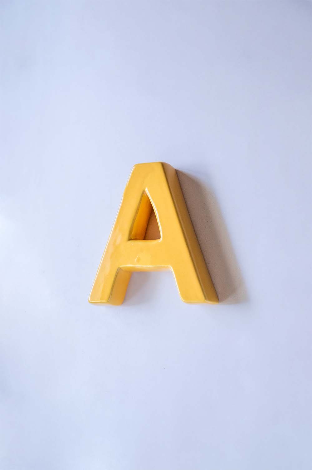 A Mottled Mono Wall Hanging - Mustard A To Z