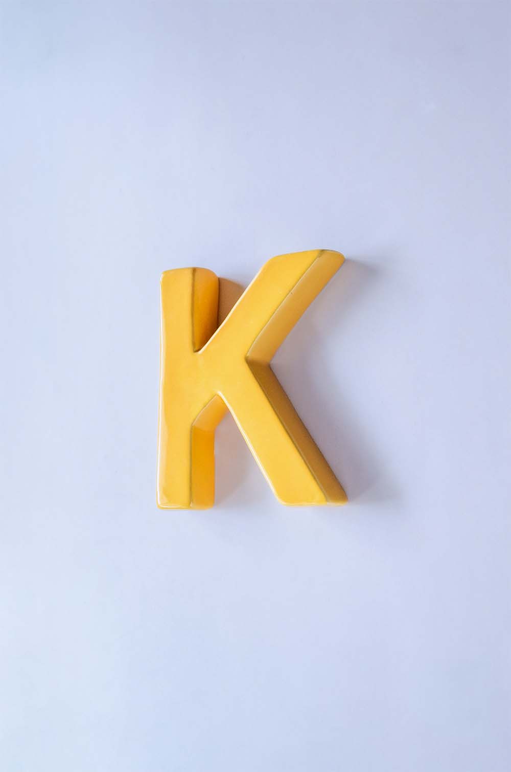 K Mottled Mono Wall Hanging - Mustard A To Z