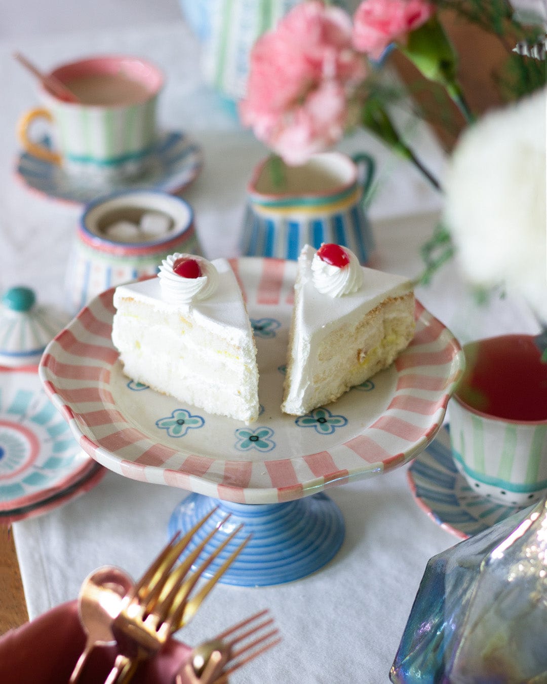 Masquerade handpainted ceramic cake stand with vibrant patterns | The Wishing Chair