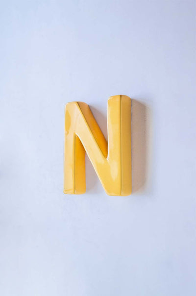 N Mottled Mono Wall Hanging - Mustard A To Z