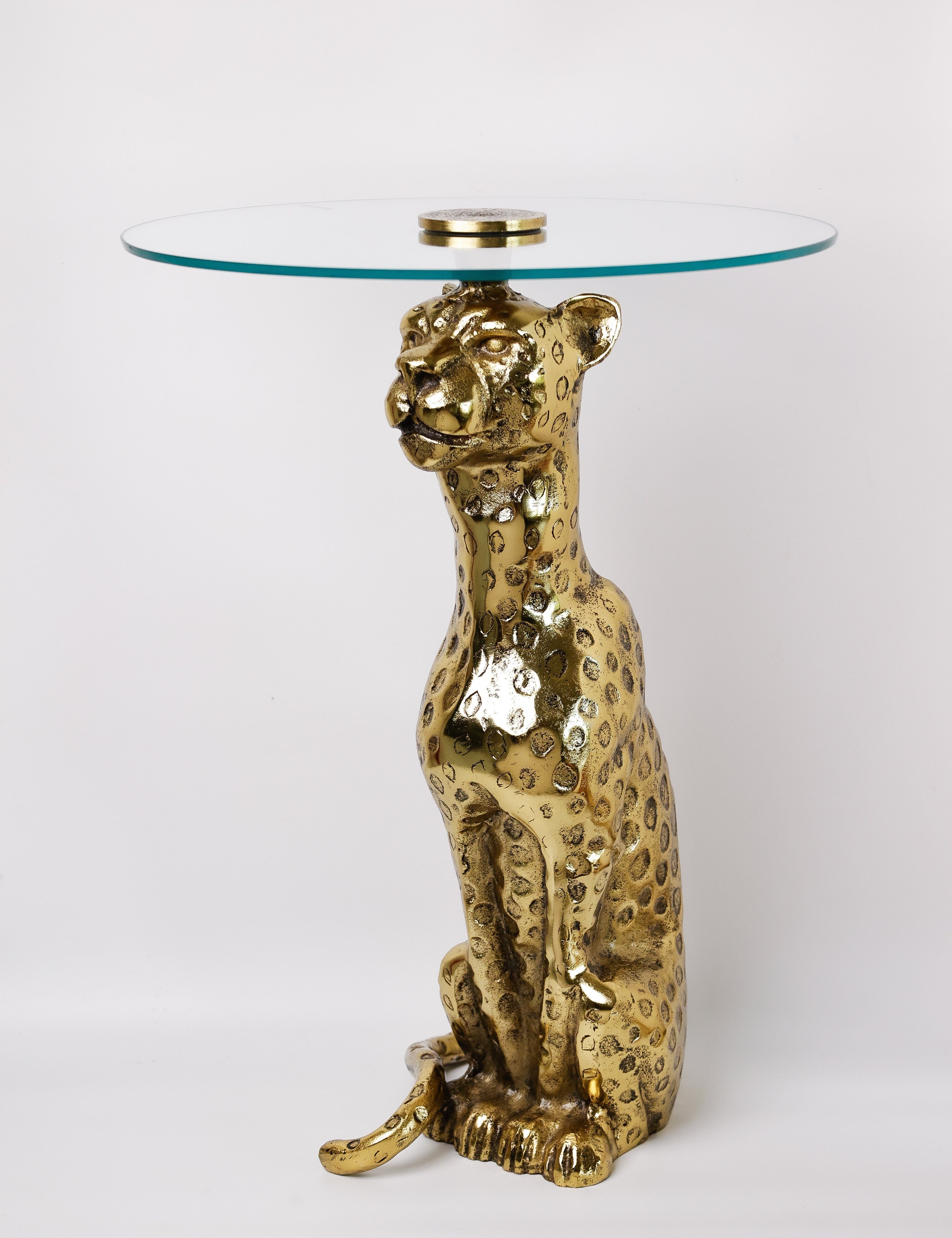 Panther metal side table with gold finish and round glass top | The Wishing Chair