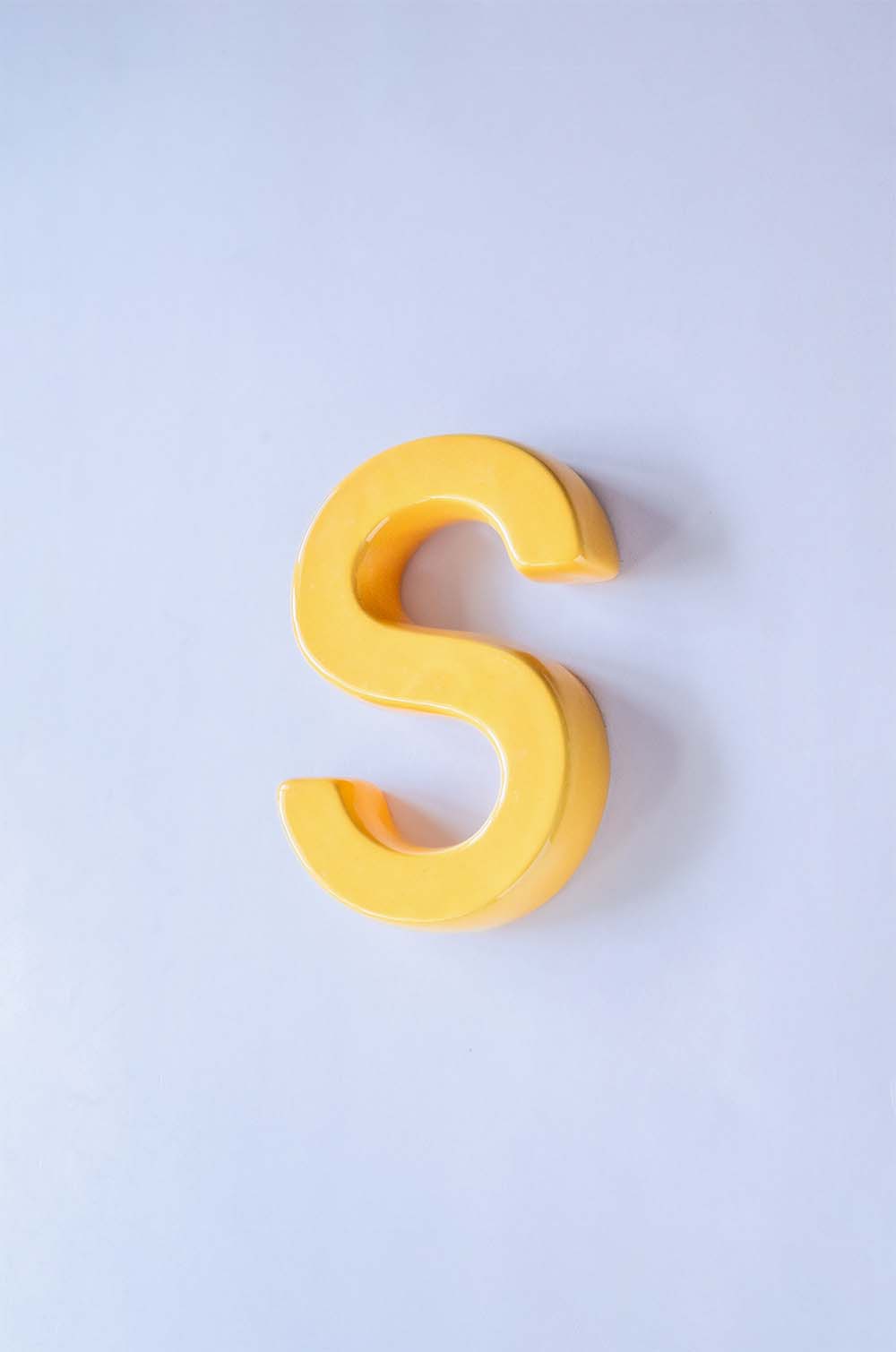 S Mottled Mono Wall Hanging - Mustard A To Z