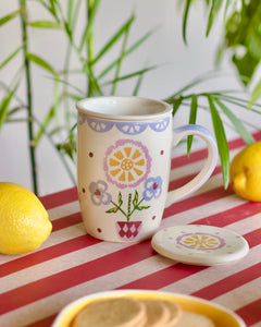 Sundrop handpainted ceramic tea strainer mug with lid by The Wishing Chair