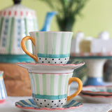 Masquerade handpainted ceramic teacups and saucers, set of 2, in pastel stripes | The Wishing Chair