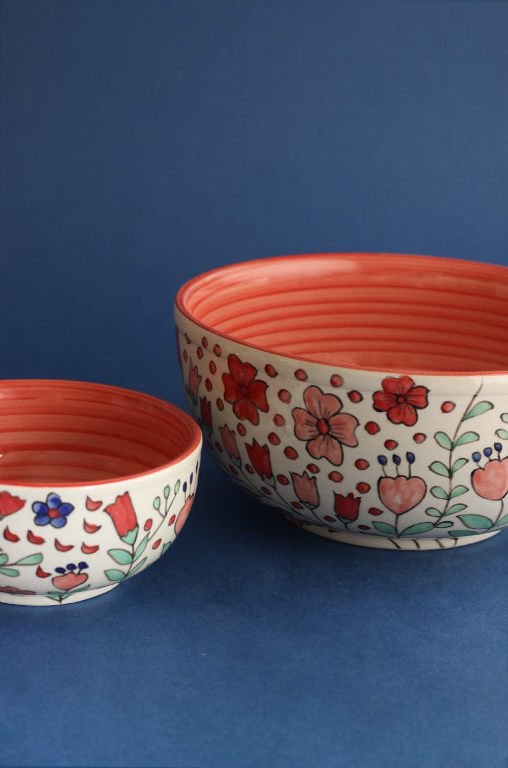 Flower Meadow BowlMaterial: Handpainted Handmade Stoneware
Dimensions: Large - 9.50 Dia x 5 H Inch, Small - 6 Dia x 3.50 H Inch

Handle with care. May Chip or Break on Impact. MicrowaFlower Meadow BowlThe Wishing Chair