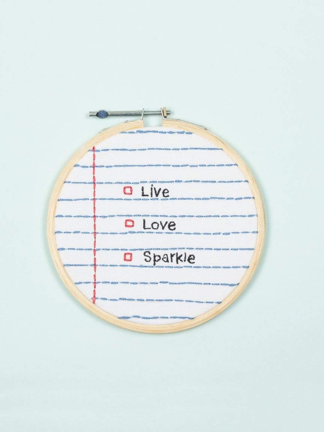 Live Love Sparkle Wall HoopMaterial: Embroidered Fabric with Wooden Frame
Dimensions: 6.5 Dia inches

Keep away from dust and moisture.

Our products are handmade, one piece at a time, and theLive Love Sparkle Wall Hoop