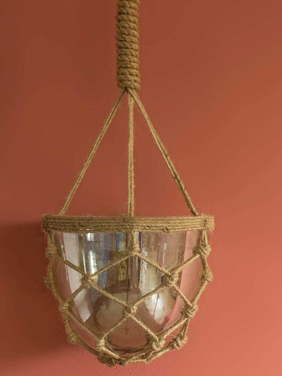 Luster Hanging Planter With Knotted RopeMaterial: Glass &amp; Jute Rope
Dimensions: 6.25 Dia x 7.25 H Inch



 Luster Hanging PlanterThe Wishing Chair