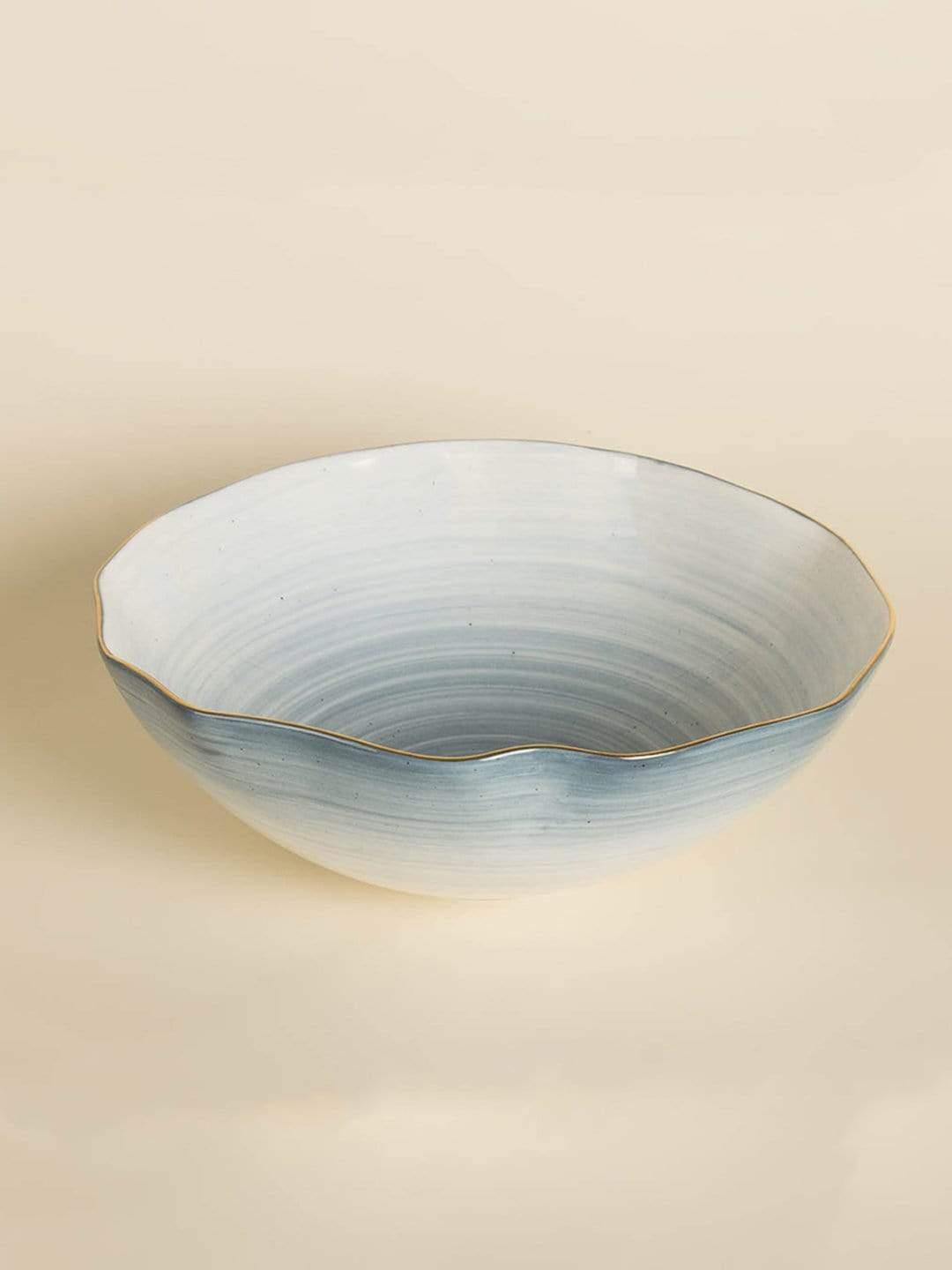 Watercolor Magic Bowl - Cerrulean BlueMaterial: CeramicsDimensions: 22d cm x 7h cmDishwasher safe, Gold rim is not Microwave safe, Do not scrub with steel wool.Will chip or break on impactOur products arWatercolor Magic Bowl - Cerrulean Blue
