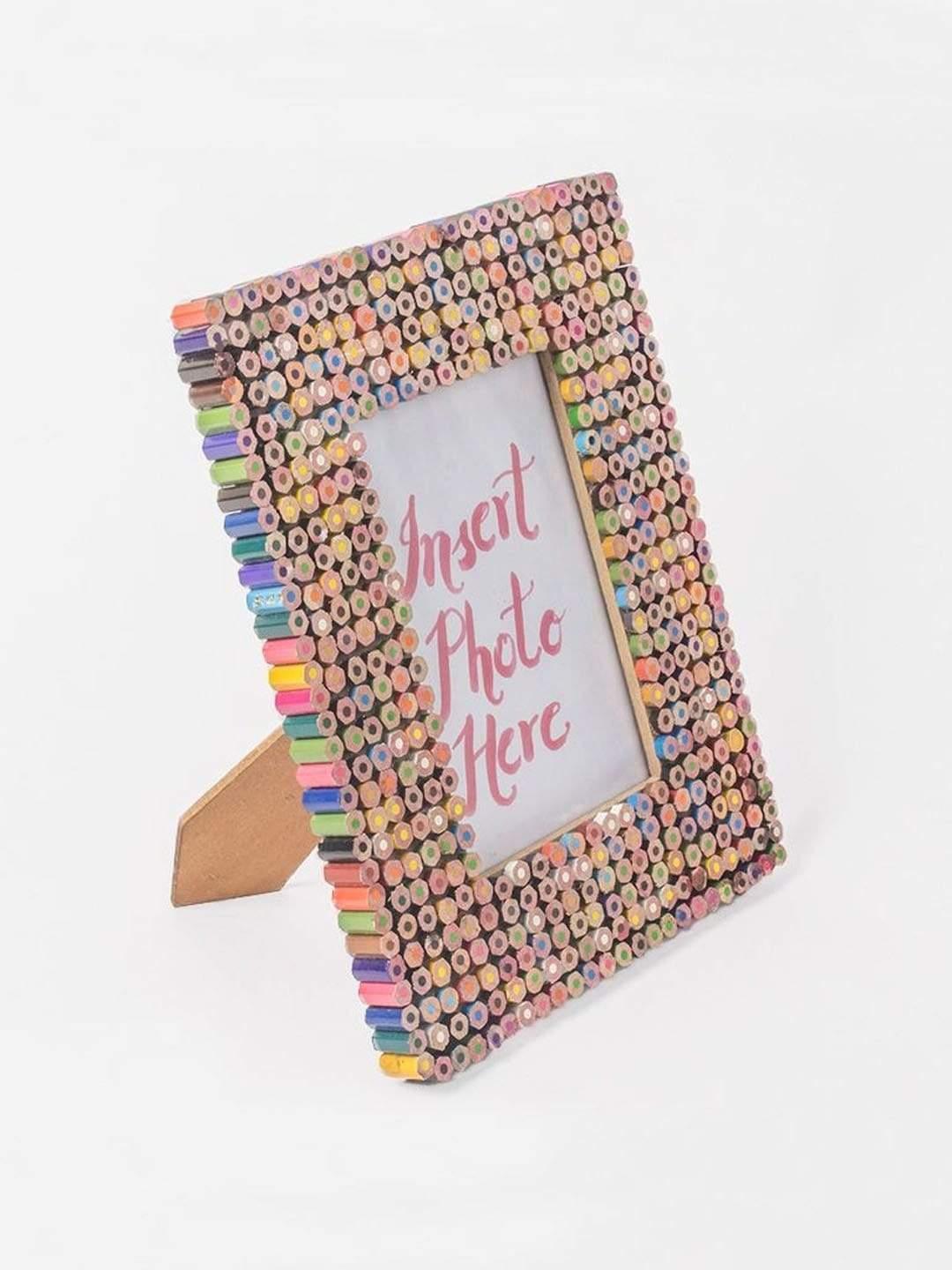 Color Pencils Photo FrameMaterial: Made of Colored Pencils and Glass
Dimensions: Frame Size - 3L x 1W x 19H CMPhoto Size - 10L x 10H CM

Do not wash, Wipe dry, Keep away from dust and moistuColor Pencils Photo Frame