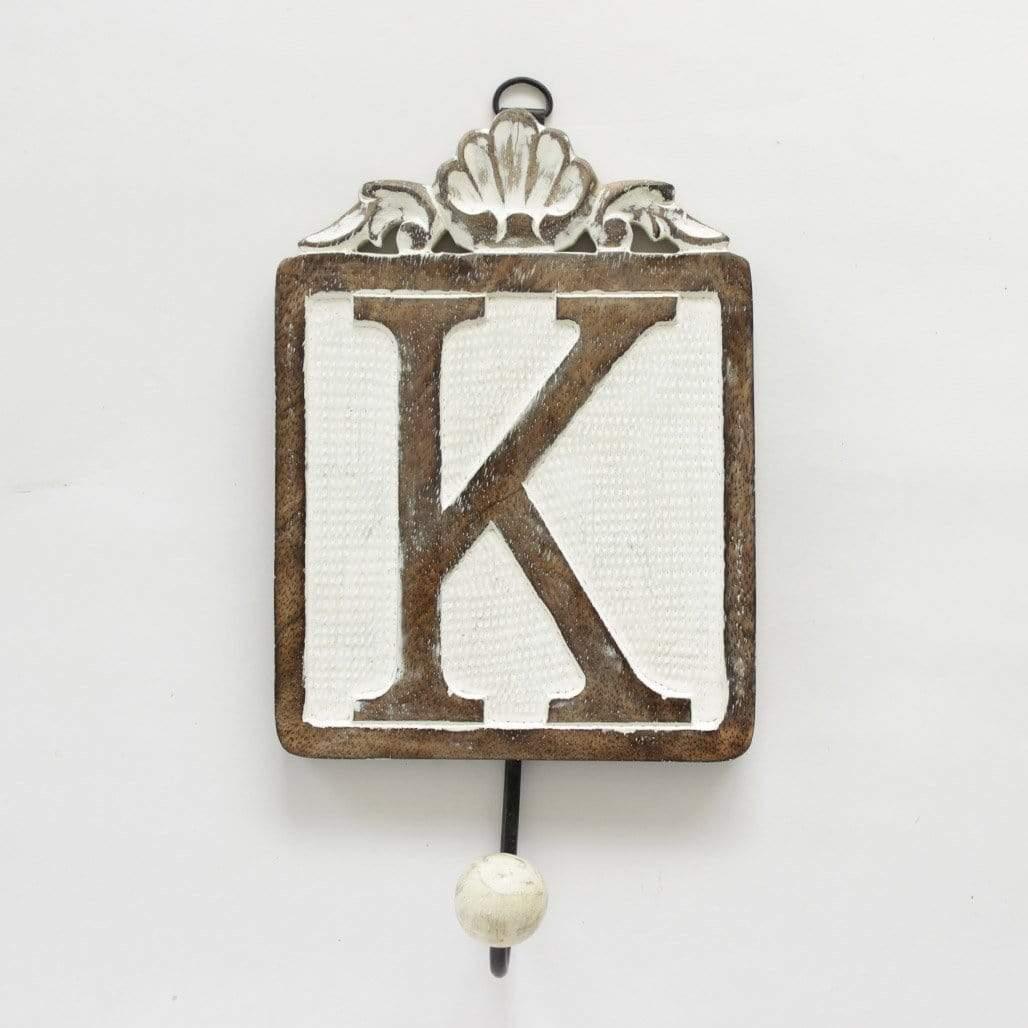 Letter Wall Hook / KABOUT: We found a great way to personalize wall hooks by giving each of them a single alphabet to have and hold. Now spell out your name, or B.E.D for a bedroom, L.OLetter Wall Hook /