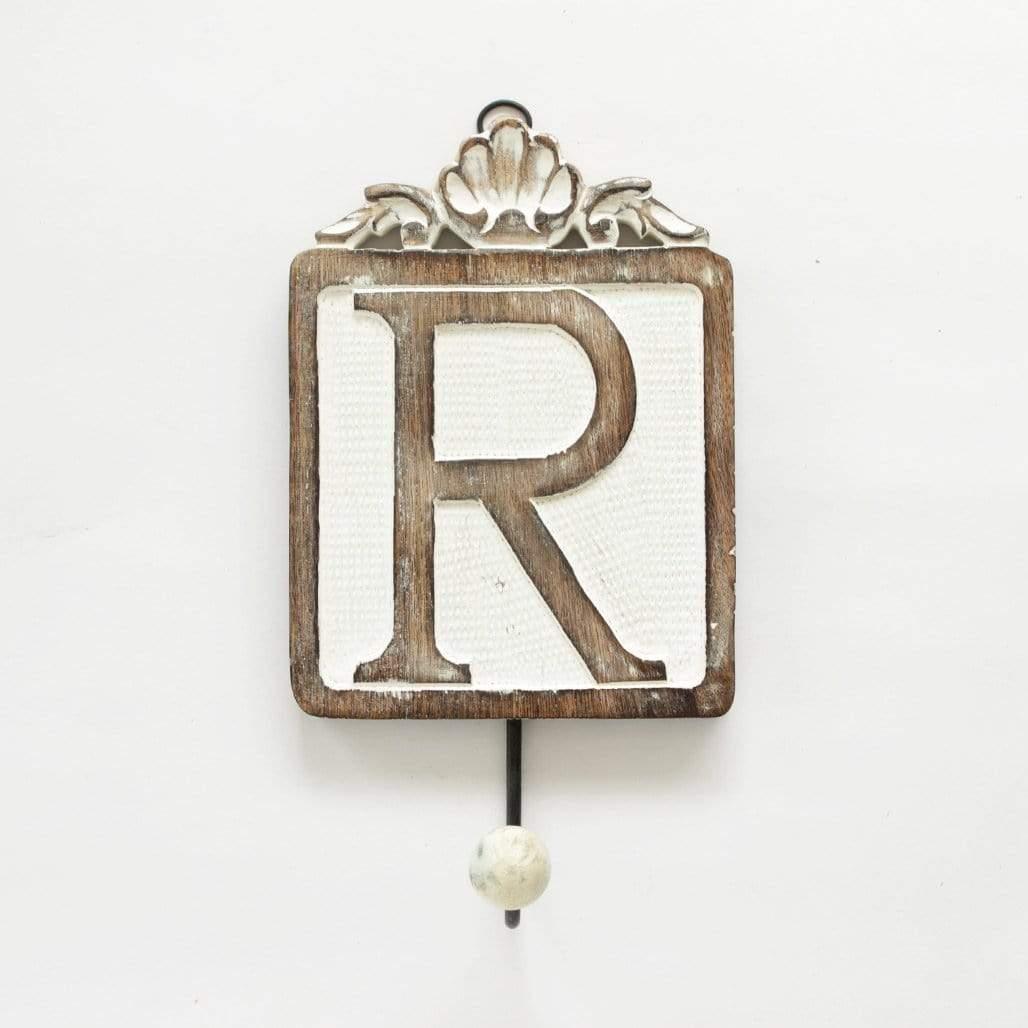 Letter Wall Hook / RABOUT: We found a great way to personalize wall hooks by giving each of them a single alphabet to have and hold. Now spell out your name, or B.E.D for a bedroom, L.OLetter Wall Hook /