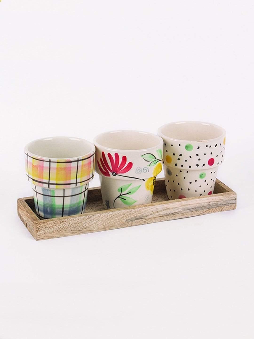 Miss Sunshine Planters With Wooden Tray -set Of 3Material: Ceramic &amp; Wood
Dimensions: 3"D inch x 3.5"H inch.

 Miss Sunshine Planters