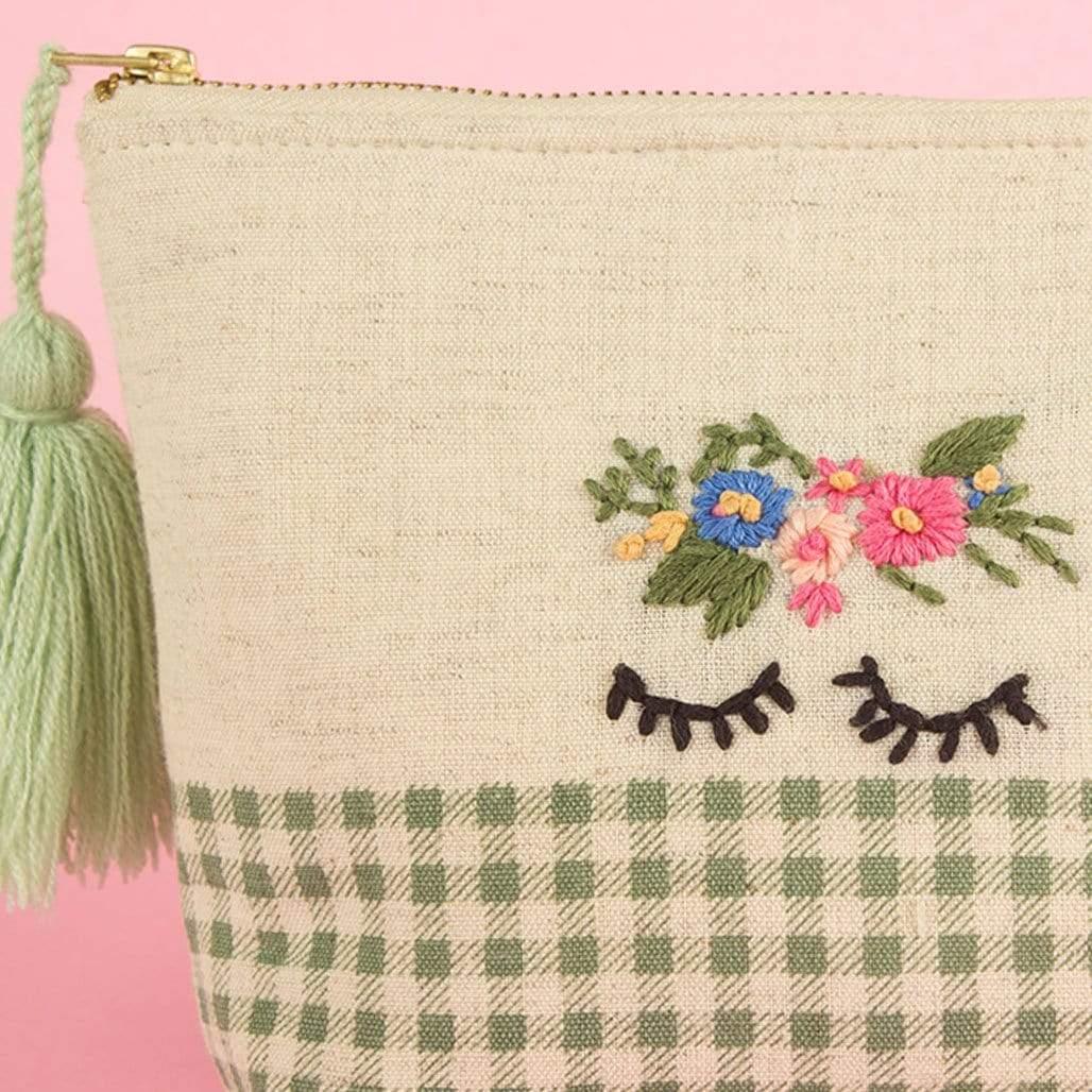 Pretty Eyes PouchMaterial: Printed Cotton Fabric with Embroidery, Metal Zip and Tassels
Dimensions: 8L x 6H Inch

 Pretty Eyes PouchThe Wishing Chair