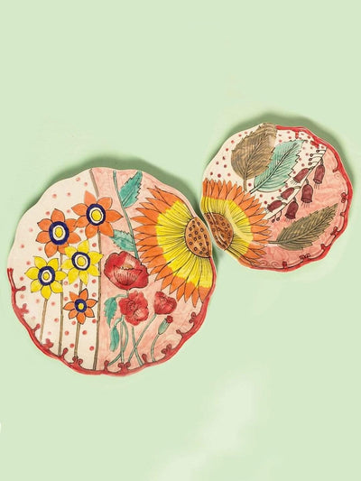 Sunflower Wall Plates - Set Of 2Dimensions: Big Plate -10 Inch and Small plate - 7 Inch
Handpainted Ceramic. Weights may vary since these are handmade.Sunflower Wall Plates - SetThe Wishing Chair