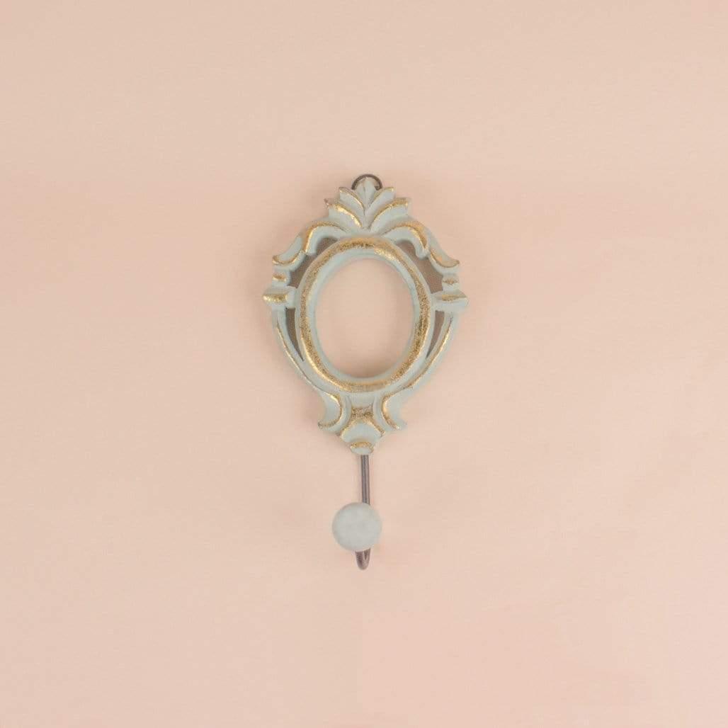Wisteria Wall Hook - Mint Green
Material - Hand painted Mango wood with metal hook
Size -   L = 8.5  X W = 4 X H = 1 Inches
Material:  Wooden - 
 Wall hook 
 Wisteria Wall Hook - Mint Green