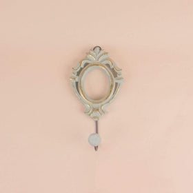   Wisteria Wall Hook - Mint Green
Material - Hand painted Mango wood with metal hook
Size -   L = 8.5  X W = 4 X H = 1 Inches
Material:  Wooden - 
 Wall hook 
 Wisteria Wall Hook - Mint Green - Wisteria Wall Hook - Mint Green - The Wishing Chair  - Wisteria Wall Hook - Mint Green - The Wishing Chair 